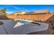 Private backyard pool and artificial turf at 6608 Fort William St, North Las Vegas, NV 89084