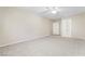 Bright bedroom featuring ceiling fan and ample space at 8405 Sewards Bluff Ave, Las Vegas, NV 89129