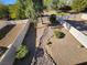 Spacious backyard with a rock garden and trees at 85 Day Trade St # 2, Henderson, NV 89074