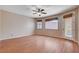 Bright living room with wood flooring and backyard access at 9747 Logrondo St, Las Vegas, NV 89178