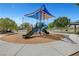 Modern playground structure with a slide and shade canopy at 9747 Logrondo St, Las Vegas, NV 89178