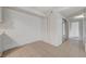 Dining area with textured walls, tile floors, storage closet and door to hallway at 1701 E Katie Ave # 99, Las Vegas, NV 89119