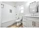 Bright bathroom with white subway tile, modern vanity, and updated fixtures at 2821 Vista Butte Dr, Las Vegas, NV 89134