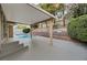 Relaxing pool area with covered patio and landscaping at 293 Helmsdale Dr, Henderson, NV 89014