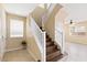 Staircase with hardwood treads and white railings at 324 Trailing Putt Way, Las Vegas, NV 89148