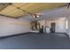 Spacious garage with washer, dryer, water softener, and extra storage at 8705 Villa Ridge Dr, Las Vegas, NV 89134