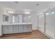 Elegant bathroom featuring double sinks and a shower at 8731 Black Cordon Rd, Las Vegas, NV 89139