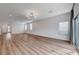 Bright and airy living room featuring hardwood floors at 8731 Black Cordon Rd, Las Vegas, NV 89139