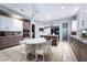 Modern kitchen with island, stainless steel appliances, and wood cabinets at 921 Granger Farm Way, Las Vegas, NV 89145