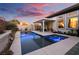 Luxury pool and spa with a covered patio at 921 Granger Farm Way, Las Vegas, NV 89145