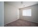 Bright bedroom featuring carpet flooring and a window at 10142 Rice Paper St, Las Vegas, NV 89183