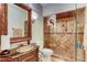 Elegant bathroom with glass shower and dark vanity at 128 Quail Run Rd, Henderson, NV 89014