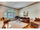 Relaxing living room with hardwood floors and large windows at 128 Quail Run Rd, Henderson, NV 89014