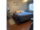 Bedroom with a king-size bed and wood floors at 1440 Vegas Valley Dr # 5, Las Vegas, NV 89169