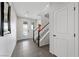 Bright entryway with tile flooring, staircase, and access to interior at 194 Sicily Hills Ct, Henderson, NV 89012