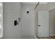 Contemporary bathroom featuring a shower with wave-patterned tile and a modern faucet at 2603 Savannah Springs Ave, Henderson, NV 89052