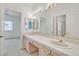 Bathroom with double vanity and tiled flooring at 2941 Harbor Cove Dr, Las Vegas, NV 89128