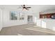 Kitchen and dining area with tile floors and sliding glass doors at 3509 Mastercraft Ave, North Las Vegas, NV 89031