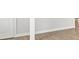 Light brown wood-look floor and white baseboards at 3616 Chevy Chase Ave, Las Vegas, NV 89110