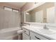 Clean bathroom featuring a bathtub and vanity at 7556 Kalmalii Ave, Las Vegas, NV 89147