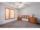 Bedroom with wood furniture and neutral carpeting at 7828 Canoe Ln, Las Vegas, NV 89145