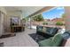 Covered patio with outdoor furniture and a view of the pool at 8636 Grandbank Dr, Las Vegas, NV 89145