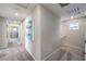 Bright hallway with modern art and access to bedrooms at 1053 Gentle Swan St # 676, Henderson, NV 89011