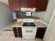 Close-up view of the kitchen's stove and countertops at 2500 Holly Ave, Las Vegas, NV 89106