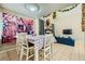 Dining area with table and chairs, open to living room at 4224 Timpani Dr, Las Vegas, NV 89110