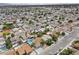 Aerial view of a neighborhood, highlighting a house with a pool at 4431 El Campana Way, Las Vegas, NV 89121