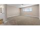 Spacious bedroom with plush carpeting and neutral walls at 4431 El Campana Way, Las Vegas, NV 89121