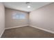 Simple bedroom with neutral walls and carpet flooring at 4431 El Campana Way, Las Vegas, NV 89121