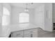 Bright dining area with white cabinets and wood flooring at 509 Indian Bluff St # 202, Las Vegas, NV 89145