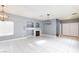 Bright living room with tiled floors and a fireplace at 5843 Aimless St, Henderson, NV 89011