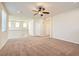 Open loft with high ceilings and neutral carpeting at 6989 Florido Rd, Las Vegas, NV 89178