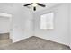 Spacious bedroom with ceiling fan, window blinds, and double door closet at 7883 Bethel Heights Ln, Las Vegas, NV 89113