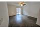 Living room with tile floors and sliding door to patio at 9013 Progressive Ct, Las Vegas, NV 89149