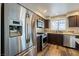 Stainless steel appliances and granite countertops highlight this updated kitchen at 911 Rifle Dr, Henderson, NV 89002