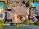 Aerial view of a house with solar panels and a pool at 10032 Emerald Pools St, Las Vegas, NV 89178