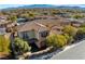 Aerial view of house and surrounding community at 10032 Emerald Pools St, Las Vegas, NV 89178