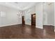 Bright living room with hardwood floors and built-in shelves at 10032 Emerald Pools St, Las Vegas, NV 89178