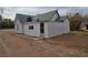 White house exterior with green metal roof at 254 W Virginia Ave, Overton, NV 89040