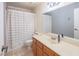 Bathroom with shower/tub combo, vanity sink, and mirror at 321 Simon Bolivar Dr, Henderson, NV 89014