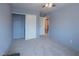 Bedroom with blue walls, a walk-in closet, and carpeted flooring at 321 Simon Bolivar Dr, Henderson, NV 89014