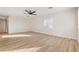 Spacious living room with new wood-style flooring and neutral paint at 4222 Calimesa St, Las Vegas, NV 89115