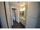 Bathroom featuring a vanity, toilet, and updated flooring at 4878 Nara Vista Way # 203, Las Vegas, NV 89103