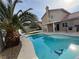 Inviting backyard with a sparkling pool and spa at 4900 Quinlan Ave, Las Vegas, NV 89130