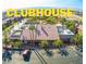 Community clubhouse with pool and surrounding buildings at 4981 River Glen Dr # 63, Las Vegas, NV 89103