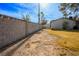 Side yard with block wall and grassy area at 6742 Palmyra Ave, Las Vegas, NV 89146