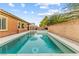 Long, rectangular pool with a tranquil ambiance, perfect for swimming laps at 7141 Royal Melbourne Dr, Las Vegas, NV 89131